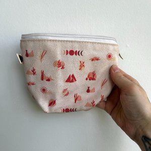 Goddess Provisions cream desert-theme makeup/toiletry bag